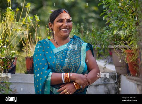 Portrait Of A Smiling Indian House Maid Stock Photo Alamy