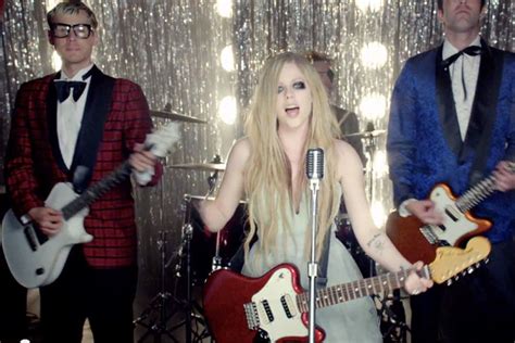 Avril Lavigne Rocks Her First Prom In New Video For “heres To Never Growing Up”