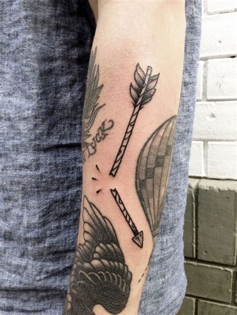 Arrow tattoo is one of the most popular minimal tattoos, and one big and one small arrow in a tattoo, not looking awkward. 79 Stunning Arrow Tattoo Designs - Mens Craze