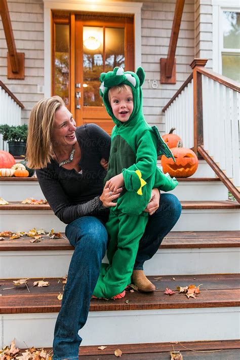 Happy Mother And Son In Halloween Costume Getting Ready Trick Or