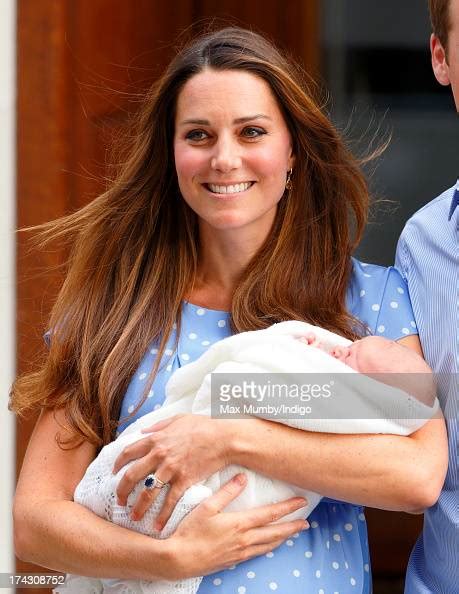 Catherine Duchess Of Cambridge Carries Her Newborn Son As She And