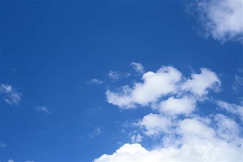 Premium Photo Bright Blue Sky With Some Clouds
