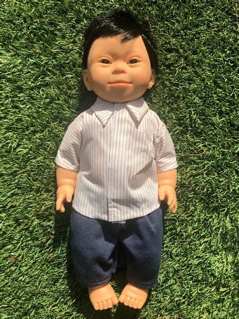 How to treat down syndrome in babies? Doll with Down Syndrome facial features
