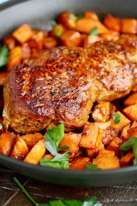 Remove the baking sheet from the oven, and with a spoon or spatula, push the potatoes to the sides of the baking sheet. Sriracha-Roasted Pork with Sweet Potatoes