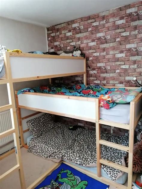 There Is A Bunk Bed In The Room With Leopard Print Rugs On The Floor