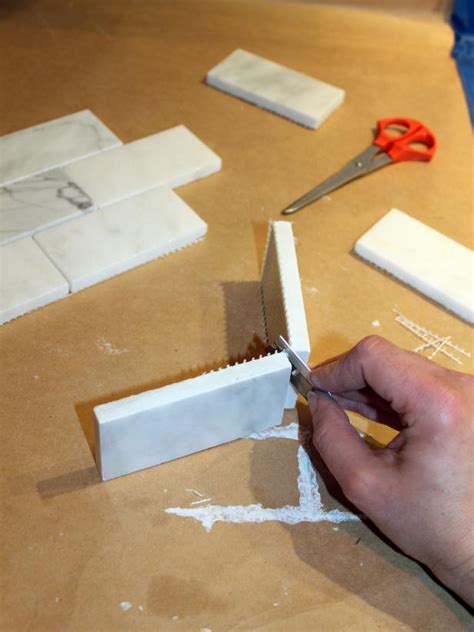 If you remember before, we had a mirror subway tile backsplash that was here when we moved into the house. How to Install a Marble Tile Backsplash | HGTV