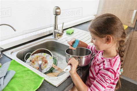 Woman Washing Dishes