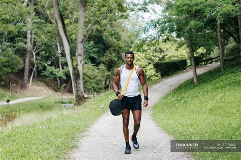 Muscular Man Walking In Park — Masculine Footpath Stock Photo