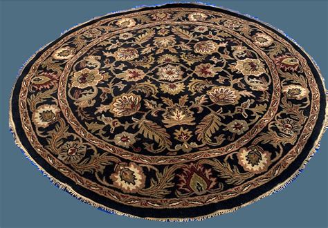 Round shaped rugs soften a square angular space. Oriental 7.10 x 7.10 Round Wool Rug - Topanga Rug Company