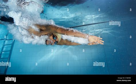 Swimmer Diving Into Pool Stock Photo Alamy
