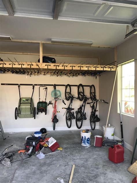 How to build and install a simple overhead rod storage rack. Ceiling fishing rod storage with over 200 sf of overhead ...