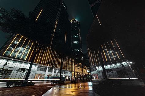 Building Photography Of High Rise Building During Nighttime Metropolis