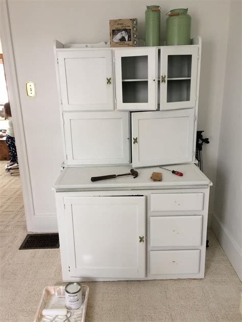 Hoosier cabinets were popular in the early 1900s, and they were usually made of oak with porcelain work surfaces that resist absorbing odors and stains. Hoosier Cabinet Makeover in the Office - The Definery Co ...