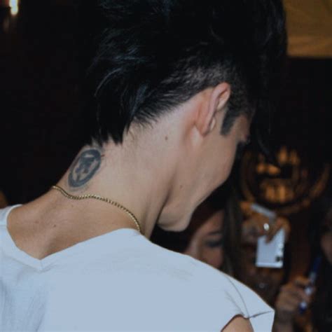 Bill's first tattoo is a symbol of his band, tokio hotel, located on the back of his neck. bill kaulitz, tattoo, tokio hotel - image #184913 on Favim.com