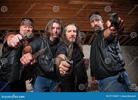 Four Mean Gang Members In Leather Jackets Royalty Free Stock