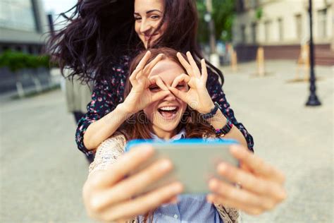 Two Girls Making Funny Selfie On The Street Having Fun Together Stock Image Image Of Smile