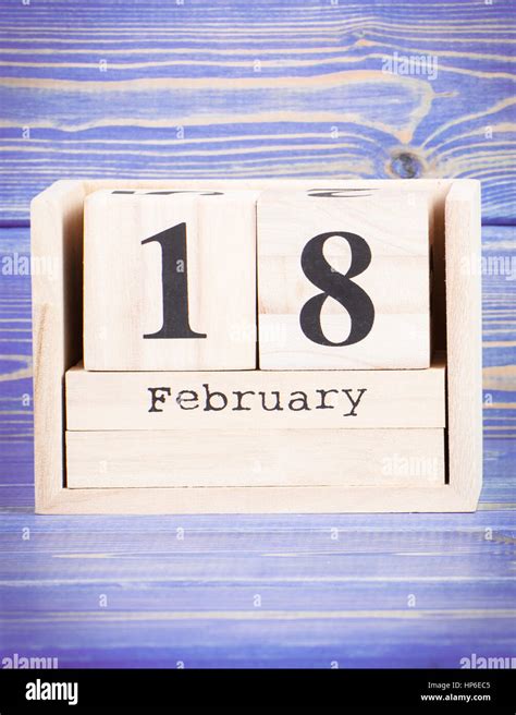 February 18th Date Of 18 February On Wooden Cube Calendar Purple