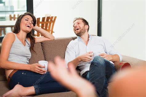 Couple Having Coffee Together On Sofa Stock Image F0053615
