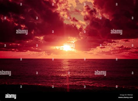 Colorful Sunset Over Ocean Stock Photo Alamy