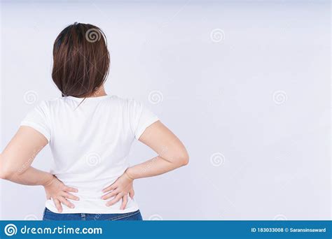Female Touching Acute Lower Back Pain On White Background With Copy