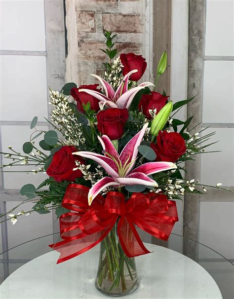 Paid for a bow but received a tiny ribbon, paid for mylar balloon that wasn't included. Roses and Lilies Deluxe in Odessa, TX | Arlene's Flowers ...