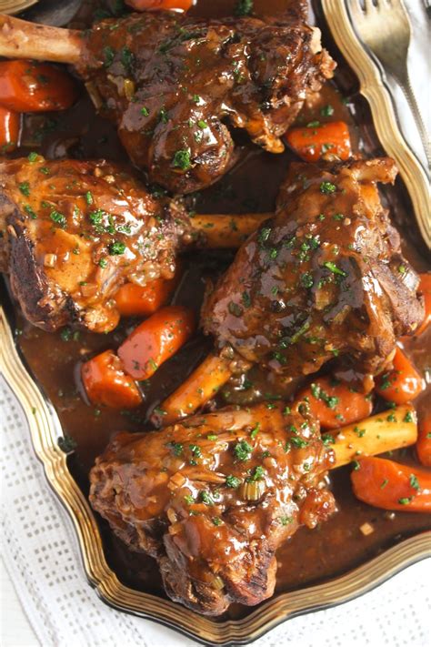 Tender Slow Cooker Lamb Shanks Simmered In A Rich Flavorful Red Wine