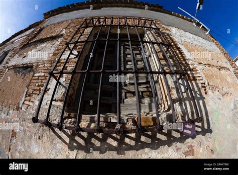 8mm lens capturing a city's heartbeat, buildings stretching into the