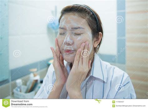 Face Wash Close Up Of Young Asian Woman Cleaning Face Skin With