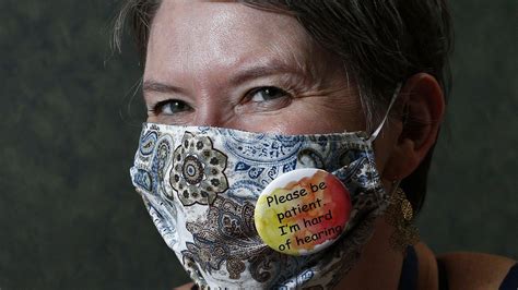 Mask Buttons Help People Wearing Hearing Aids During Pandemic