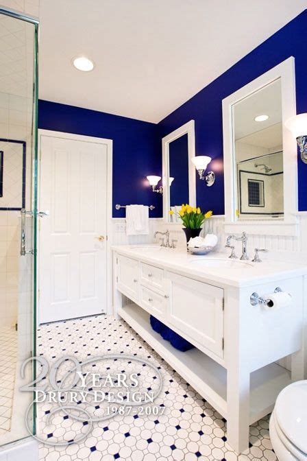 Decorating ideas for blue and white bathrooms that's why azure blue tiles from urban archaeology clad the walls of the master bath part of a fresh blue and white palette that carries throughout the whole house white woodwork and a marble tile floor provide a crisp counterpoint to the colorful hue. Small Master Bath With A Big Vision, By Drury Design ...