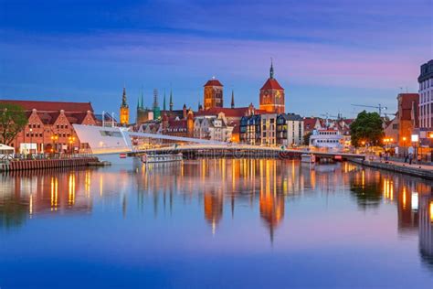 Old Town In Gdansk And Catwalk Over Motlawa River At Dusk Stock Image