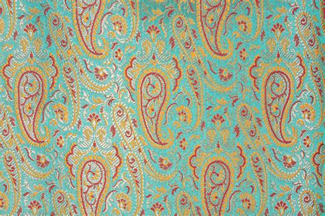 Turquoise Blue Fabric From Banaras With Paisleys Woven In Golden Thread