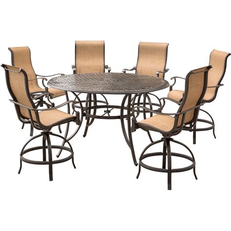 The set seats four in stylish comfort with its swivel dining chairs and round glass top table. Hanover Manor 7-Piece High-Dining Set with 6 Contoured ...