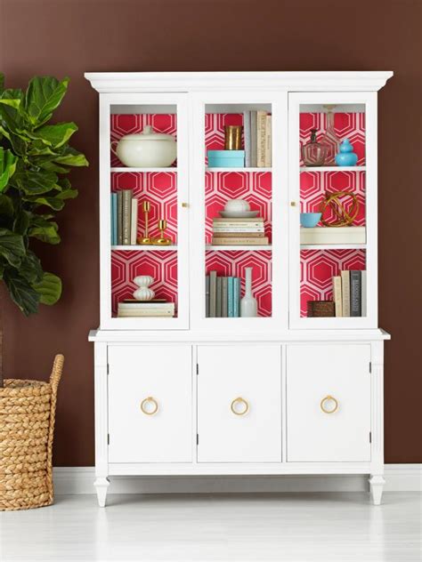 When this china cabinet came into the shop i was only interested in the bottom part. How to Wallpaper the Inside of a China Cabinet | HGTV