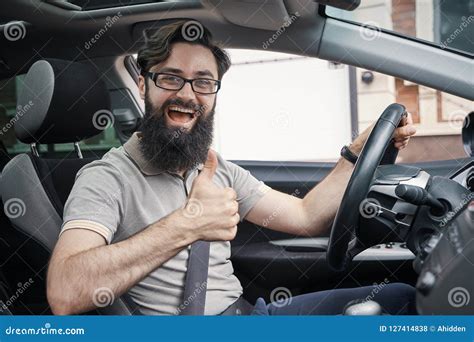 Man Driver Happy Smiling Showing Thumbs Up Driving Sport Car Stock