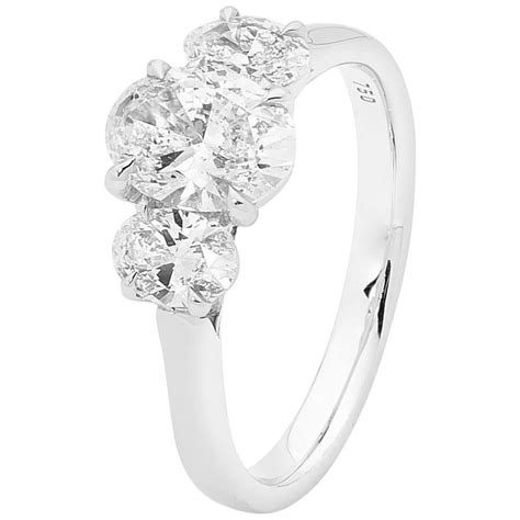 18 Carat White Gold 1 22 Carat Oval Diamond Trilogy Engagement Ring
