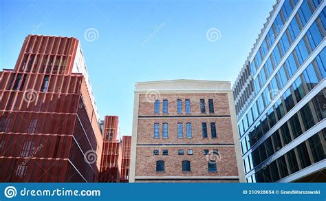 Revitalized Red Brick Building And Modern Office Building Stock Photo