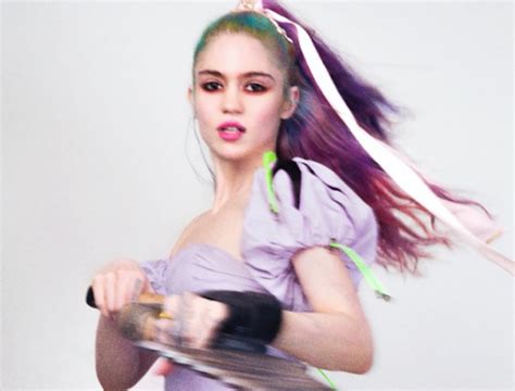Grimes Returns With New Single We Appreciate Power Mystic Sons