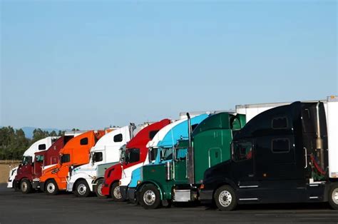 Semi Trucks Parked Together — Stock Photo © Kennytong 11547769