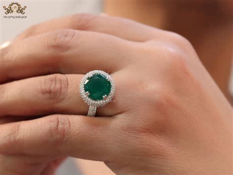 Round Emerald Green Stone Ring In Platinum And Cz