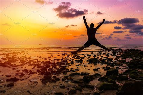Man Happy Jump Up During Sunset Nature Photos Creative Market