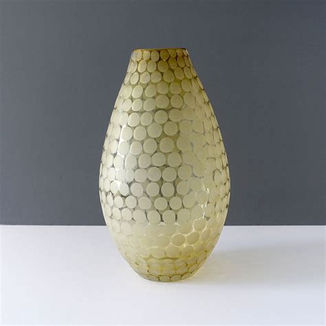 The artist has a remarkable skill with that particular feature. 9-290 Large Polka Dot Etched Teardrop Golden Glass Vase