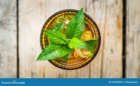 Summer Refreshment Drink With Soda Ice And Mint Leaves Selective