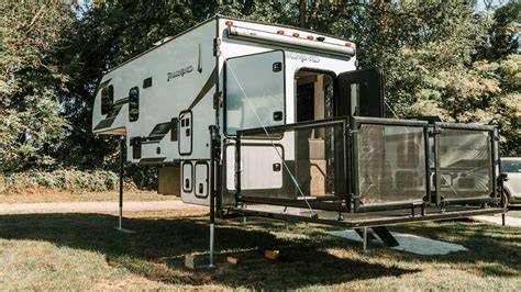 Palomino Debuts Worlds First Truck Camper With Fold Out Deck