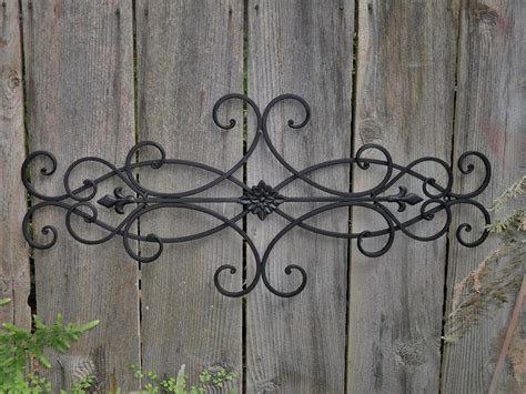 A method utilized by artists to present artwork in galleries. 15 Collection of Large Wrought Iron Wall Art