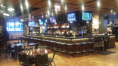 The interior has a very upscale sports bar feel, yet is equally inviting for those just looking for a good meal; Chisox Bar and Grill - Felix and Fingers Dueling Pianos