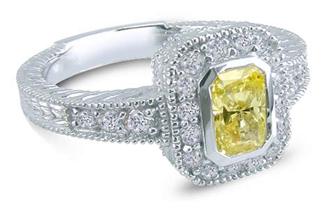Ainsley 7 Carat Radiant Emerald Cut Bezel Set Cubic Zirconia Halo Pave