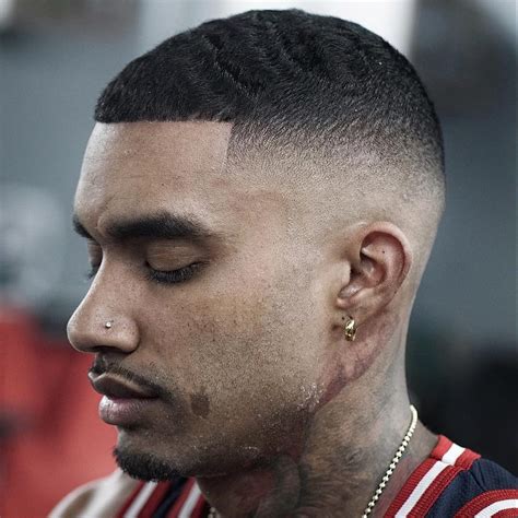 The bald fade is a stylish haircut that involves shaving the sides to a smooth or skin level. Bald Fade Haircuts