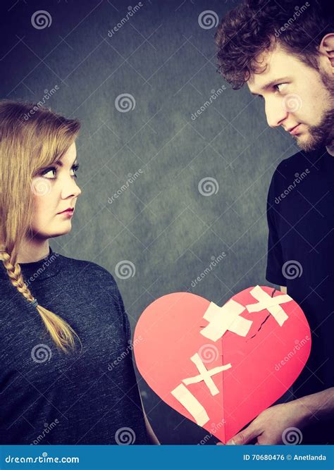 Sad Couple Holds Broken Heart Stock Photo Image Of Grief Women
