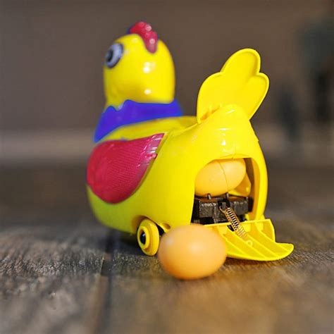 this robotic chicken toy dances around and randomly lays eggs around your home
